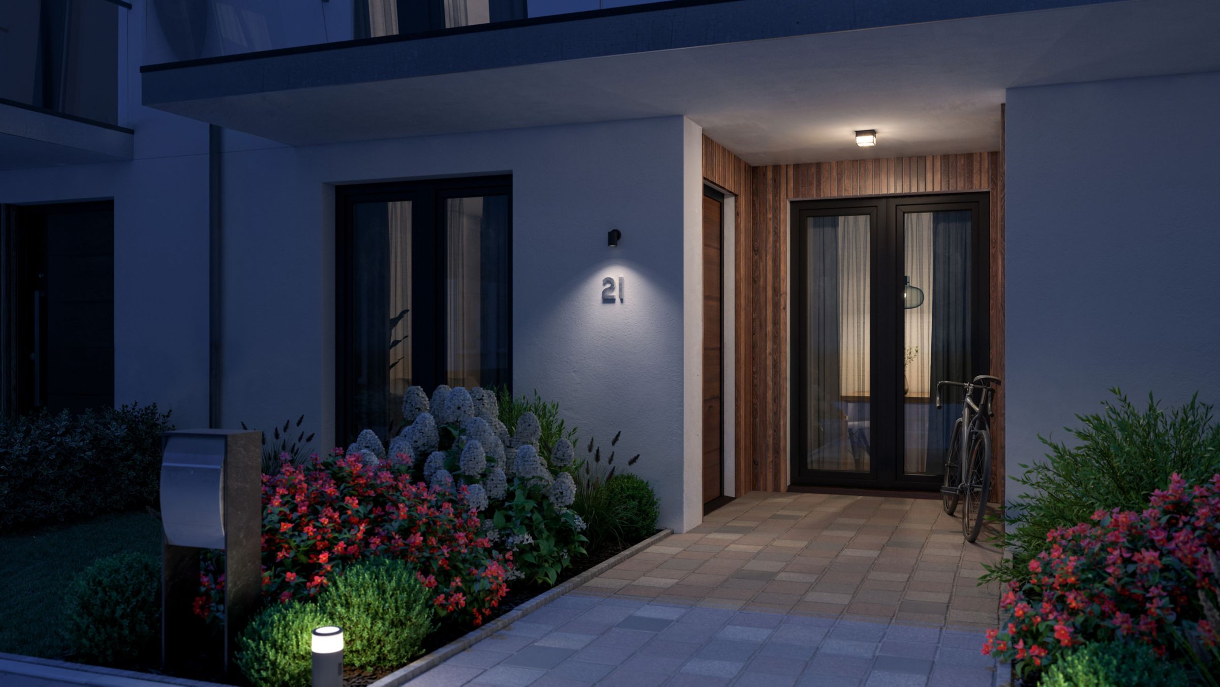 8721103165602 929004444402 Hue Struana wall spot Facade Angled View White Ambience 16x9 PUP